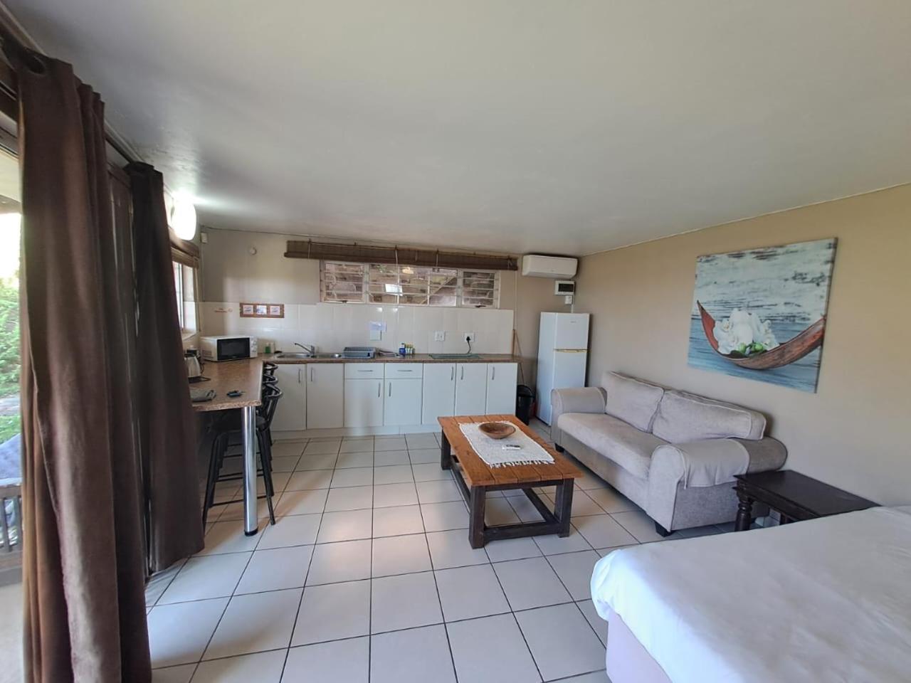 אמנזימטוטי Beachfront Cabanas מראה חיצוני תמונה